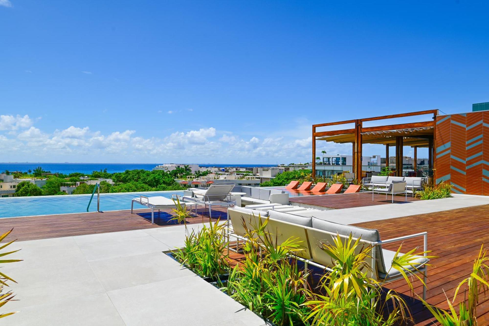 Aloft Playa Del Carmen Hotel Exterior photo Rooftop pool at the Grand at Moon Palace