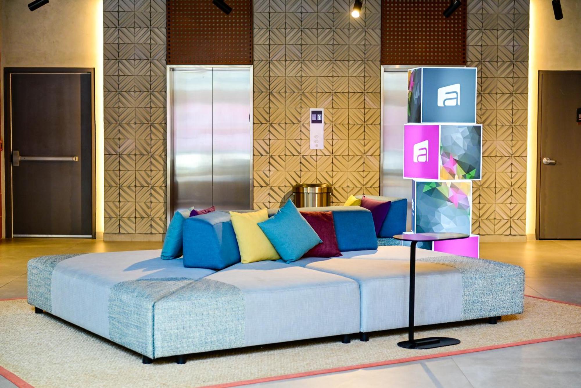 Aloft Playa Del Carmen Hotel Exterior photo The lobby of the hotel