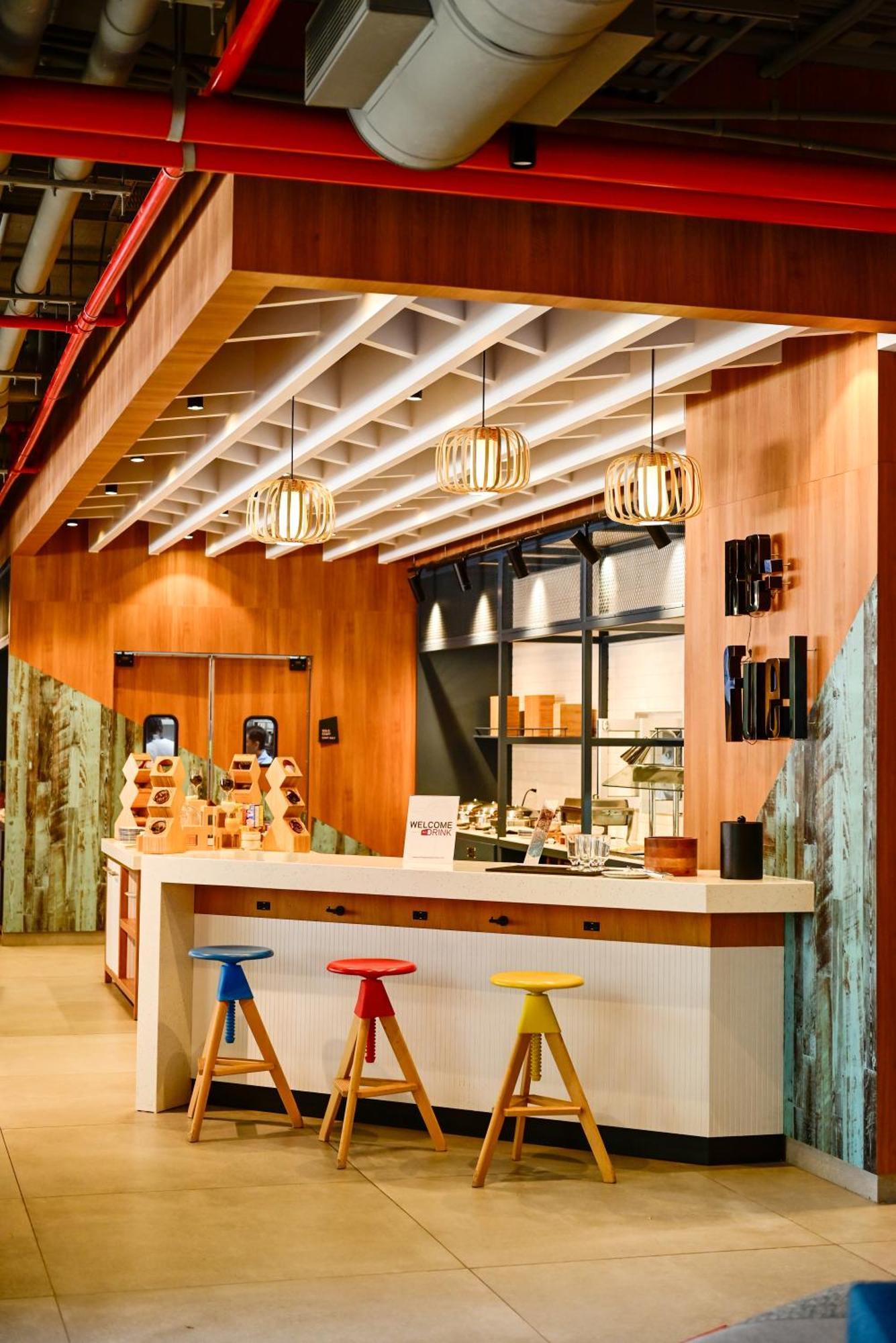 Aloft Playa Del Carmen Hotel Exterior photo The interior of a typical Starbucks Reserve store