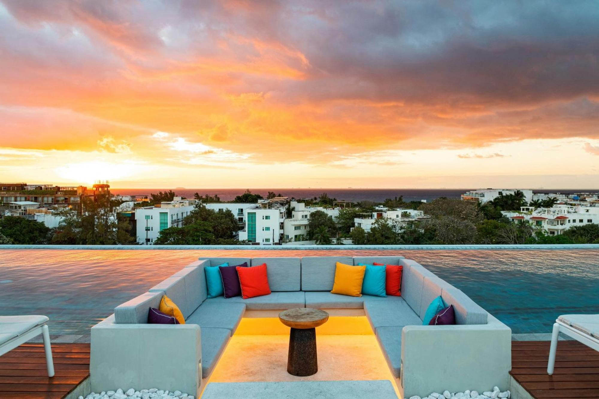 Aloft Playa Del Carmen Hotel Exterior photo Sunset at the rooftop pool