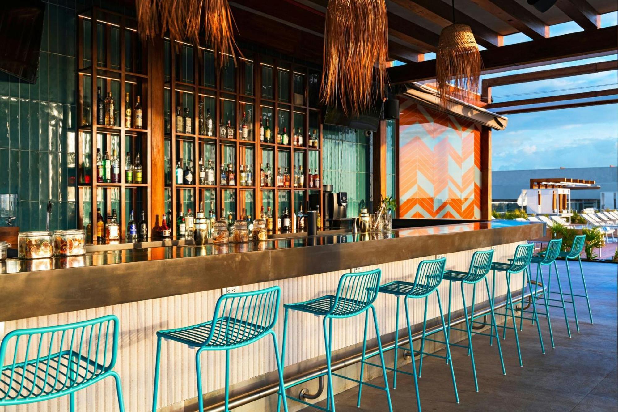 Aloft Playa Del Carmen Hotel Exterior photo The bar at the rooftop pool