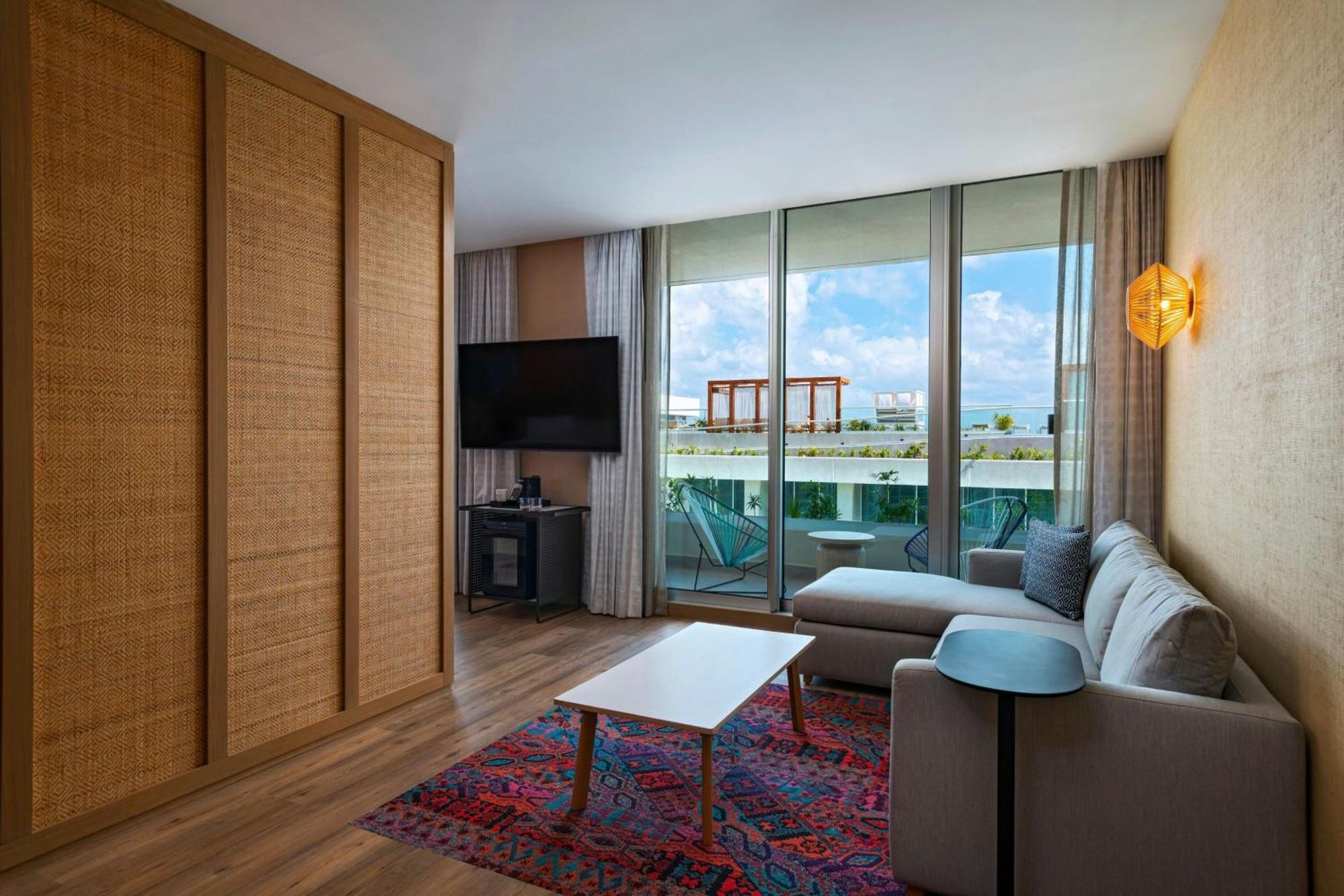 Aloft Playa Del Carmen Hotel Exterior photo A suite at the W Miami