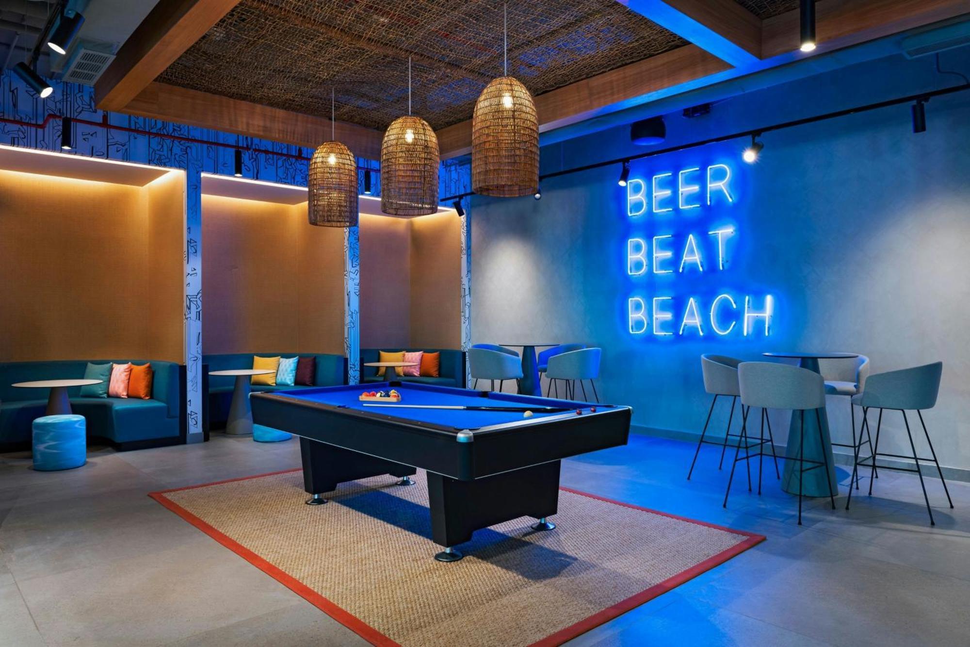 Aloft Playa Del Carmen Hotel Exterior photo The pool table at the 2018 edition of the lounge